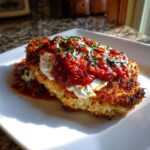 Crispy breaded chicken topped with white cottage cheese mixture and rich marinara sauce for the Cottage Cheese Chicken Parm Bowl.